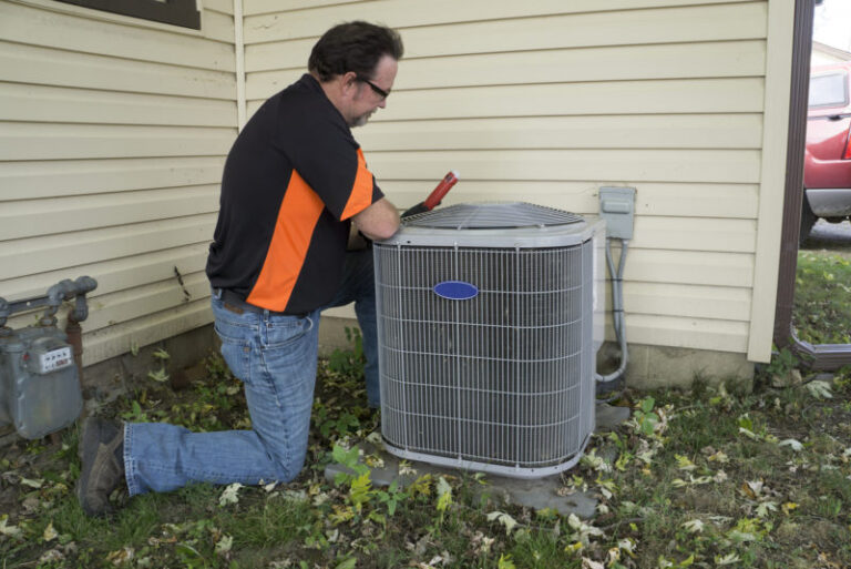 TECH professional repair HVAC unit BIGSTOCK e1541604736429
