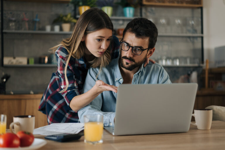 21670448ScottWalker Couple Looking at Laptop2