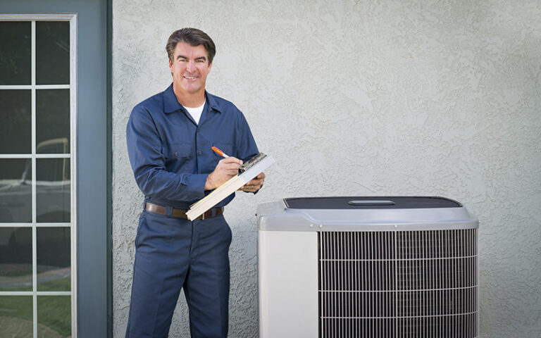 handsome tech man ac unit clipboard smile resizedblog