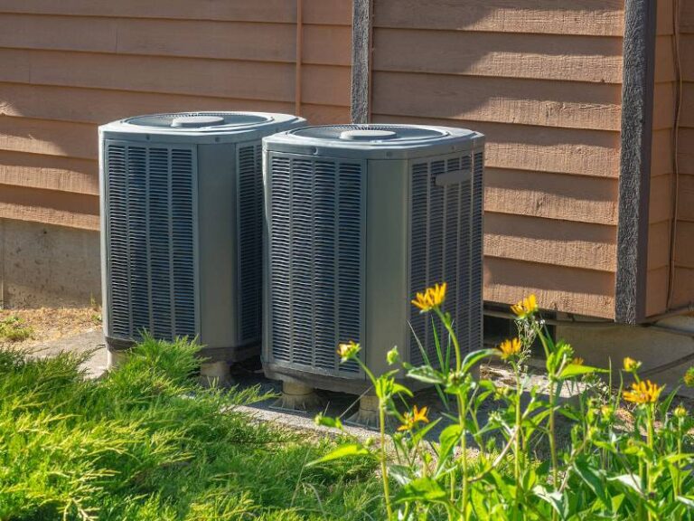 outdoor AC units with flowers